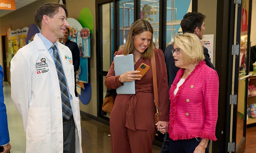 Endocrinologist Kupper A. Wintergerst, M.D., speaks with Wendy Novak at the announcement of a $15 million gift to form Wendy Novak Diabetes Institute.